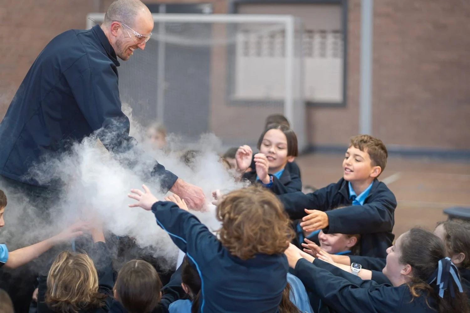 Dry ice clouds with audience close up.jpeg