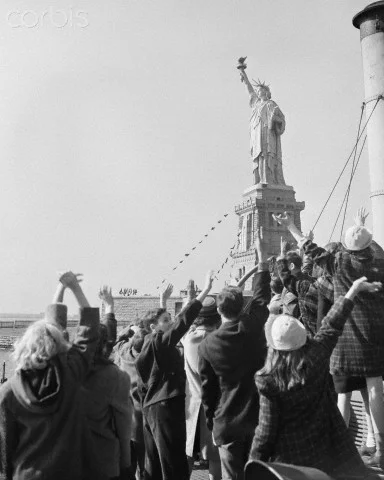 Immigrants greet the Statue of Liberty. (As an immigrant myself, I was filled with similar awe when I first saw the Twin Towers (and every time thereafter, in fact).)
