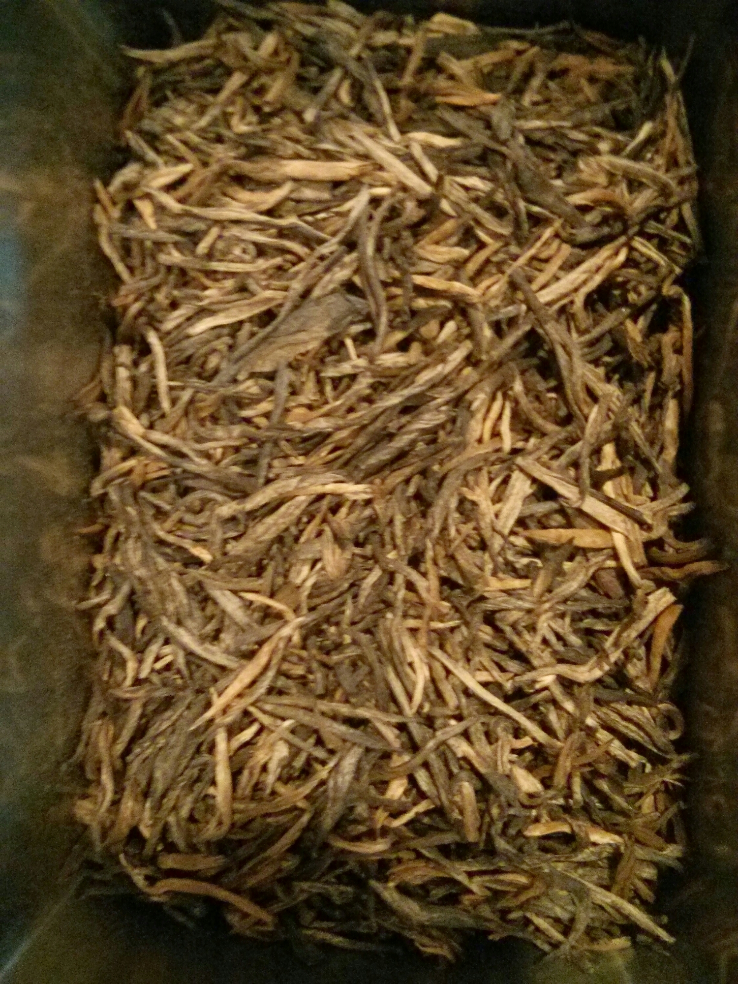 The tea looks similar to Golden Monkey or other tippy black tea, but with flatter leaves. It tasted great and produced a tea that was dark and thick.