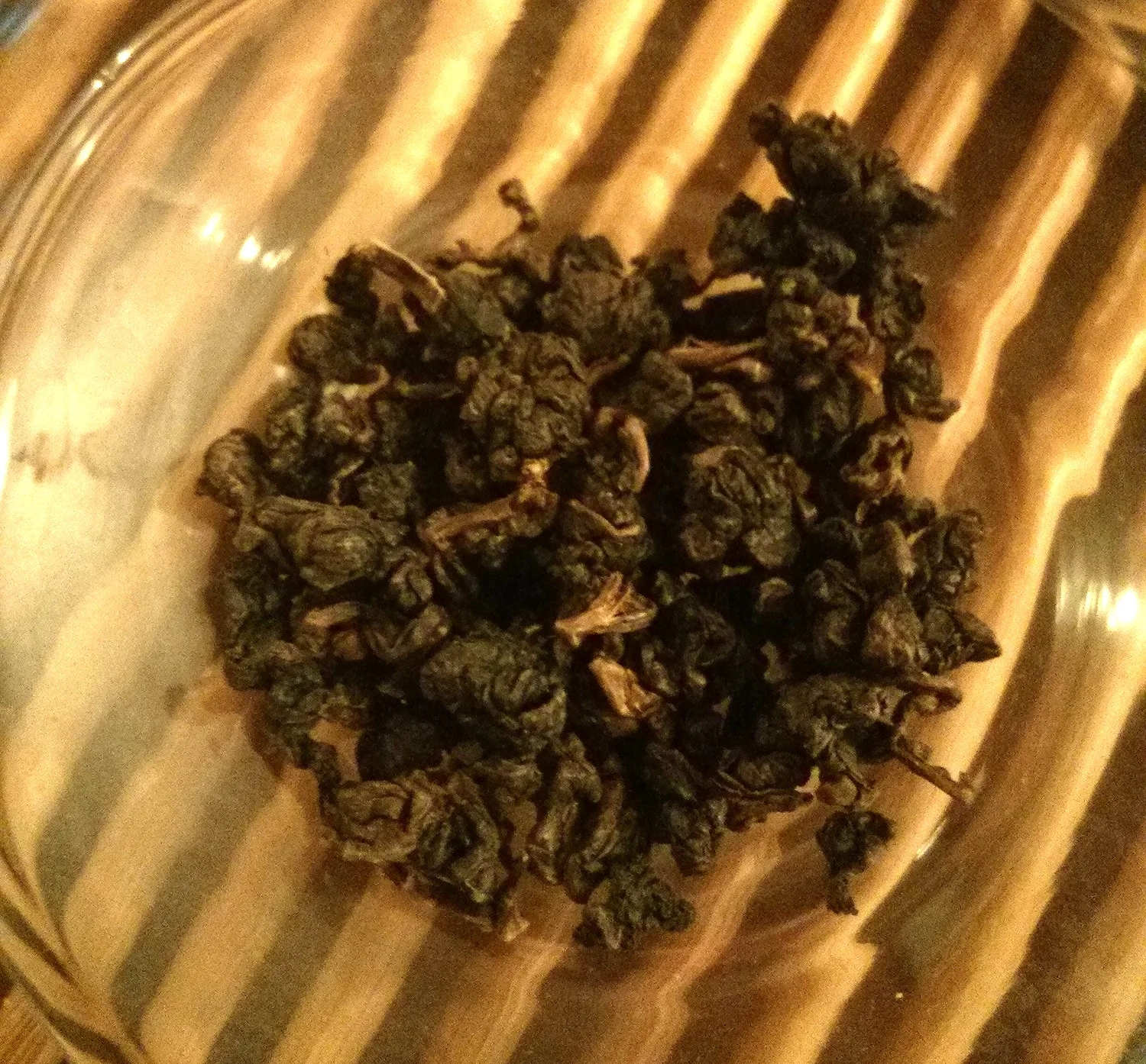 I used the recommended teaspoon or 5g of tea leaf. This photo is after a rinse to open up the leaves a little and warm up the gaiwan