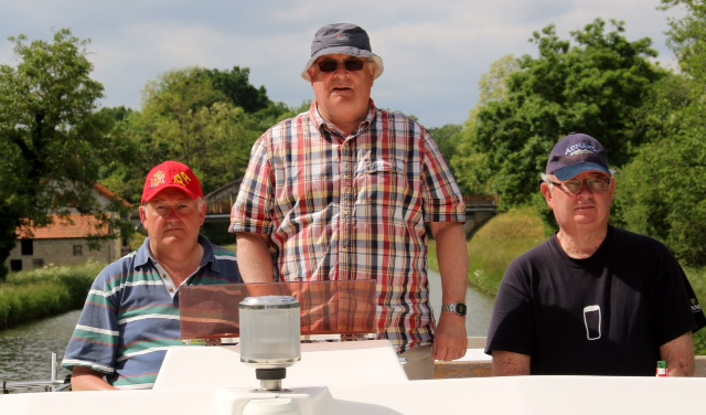 Three wise men navigating a French Canal in pursuit of wine, food and happiness ( our great friend K on the right)