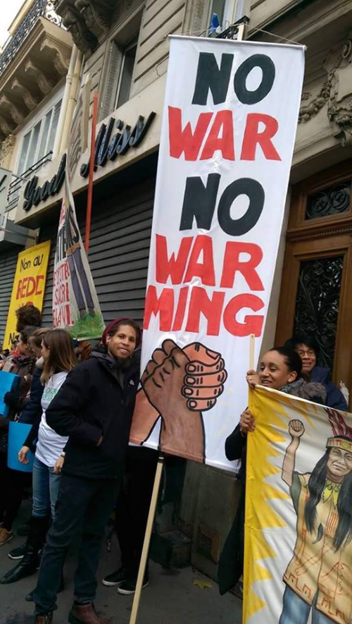 brandon king at the Human Chain action with over 10,000 people who defied the protest ban in order to stand up for peace and climate justice.