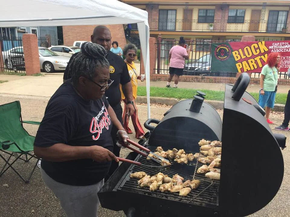 sharing food, art, music, dance and fun On poindexter street across from pitman park