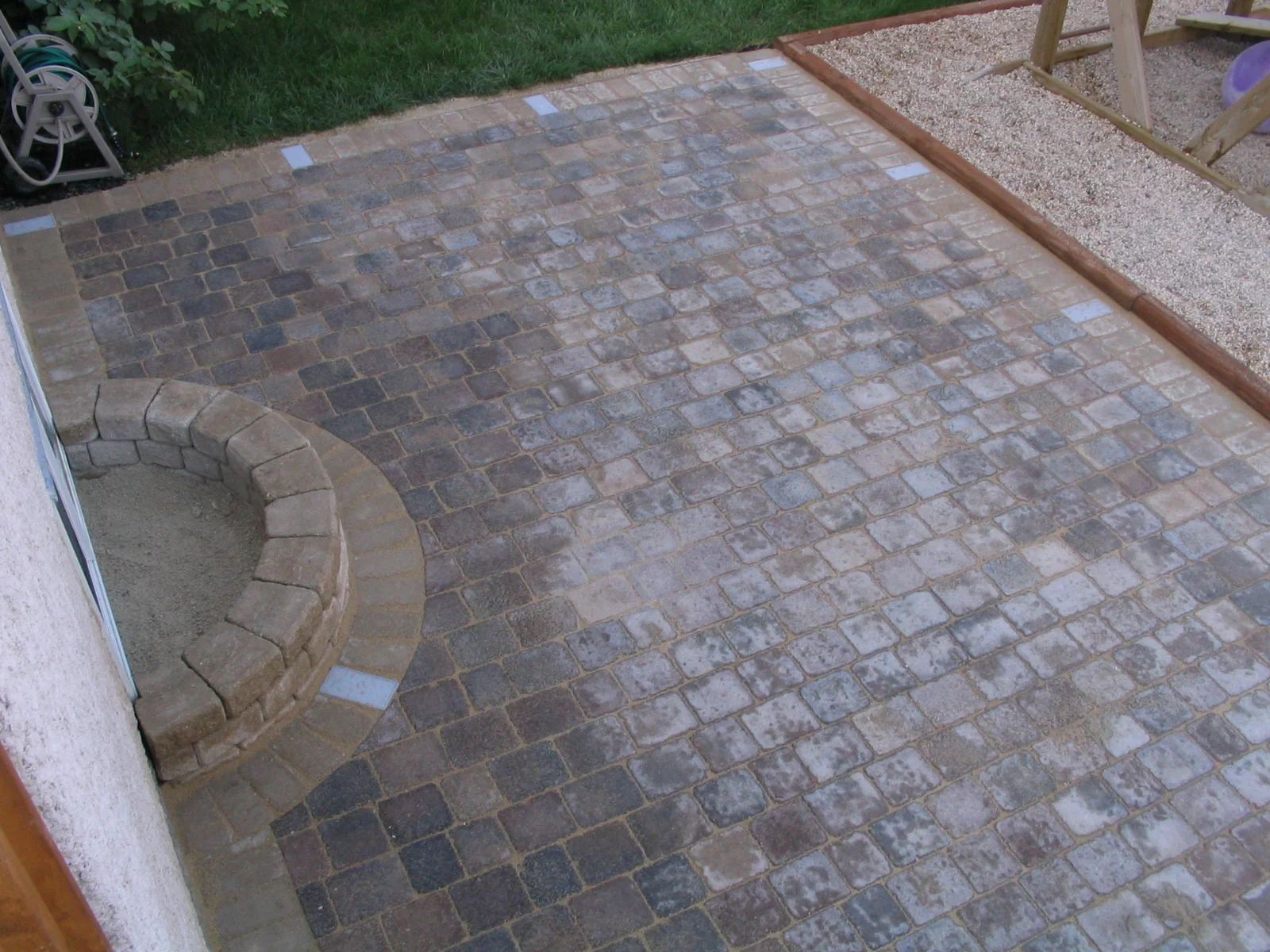 ant. brn. tuscan patio with lights and planter.JPG