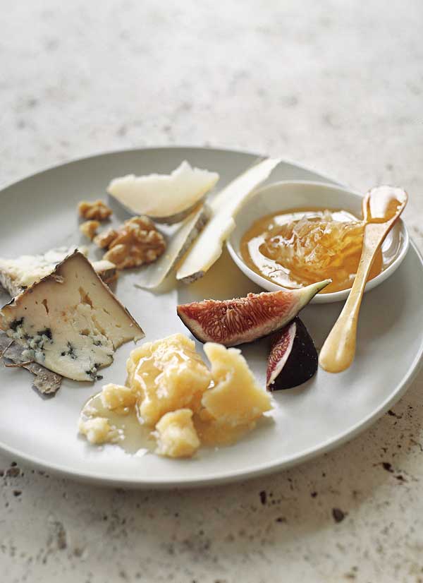 Ah, the cheese plate. Our favorite crowd-pleaser. But, mastering the art of the cheese plate is a skill. When selecting cheese plate ingredients, look for variety in texture, flavor, and color. Most cheeses come in four basic categories: aged, soft, firm, or blue. Choose one from each group as a starting point. But what about the accompaniments? Try honey, a fig compote, dates, peppered salami or salty nuts along with artisan bread and crackers. Crack open a bottle of wine and nosh the afternoon or evening away.