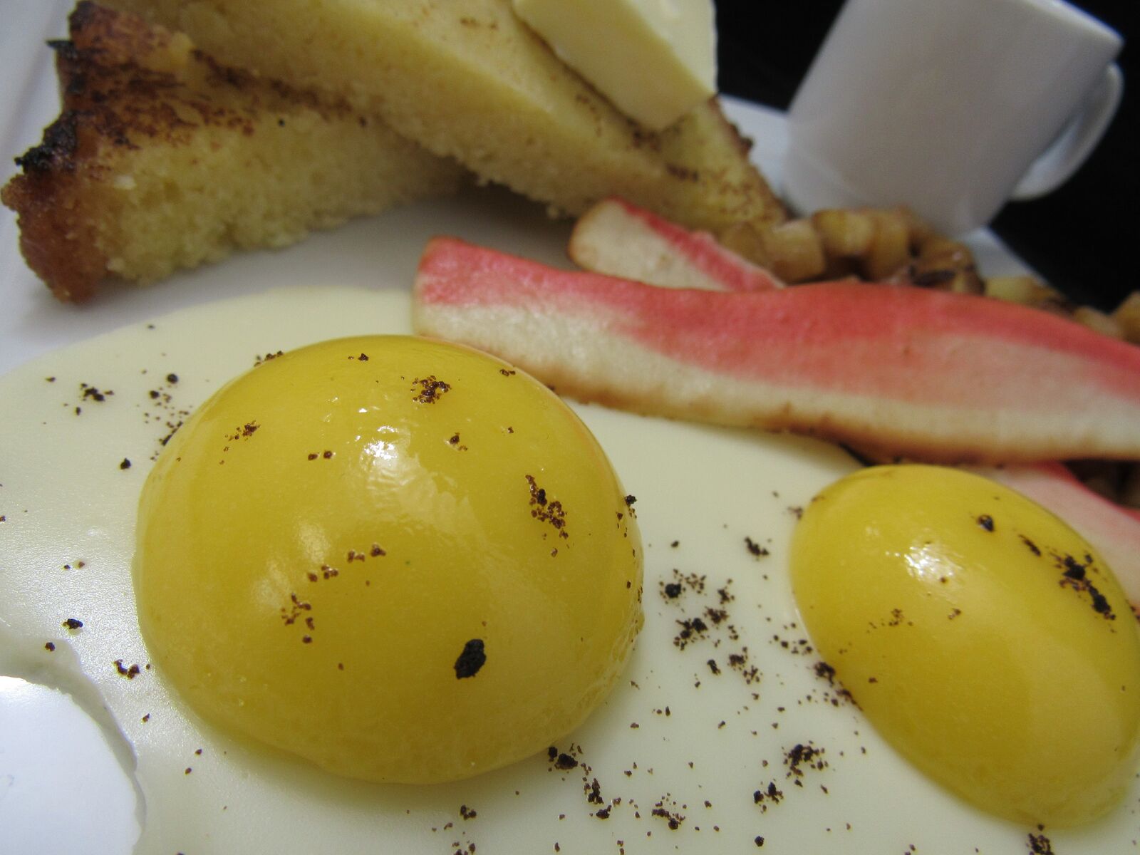 Vanilla Bean Panna Cotta & Lemon Curd “Eggs Sunnyside-Up” with Oreo Dust “Pepper”