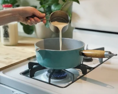 Once tea and spices have infused, add 1 C whole milk. 