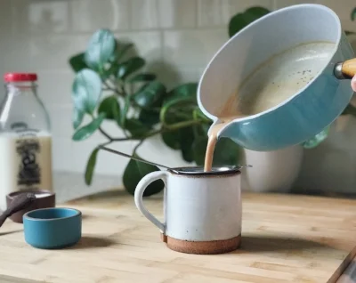 With a fine sieve, strain tea and spices and pour chai for yourself, and any guests. 