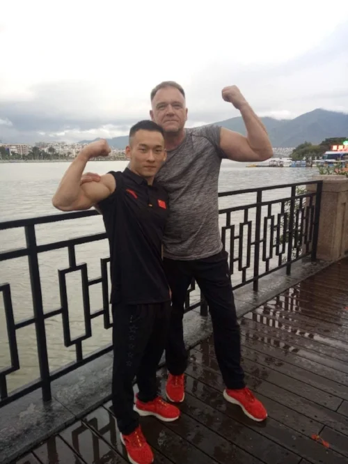 Coach Esa and Xiao Ruoteng, 2017 All-around World Champion