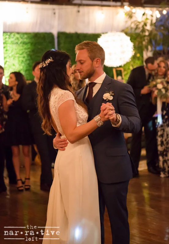 Jordan and Erik swayed with each other to oldies music for their first dance during their romantic mid-century modern affair.