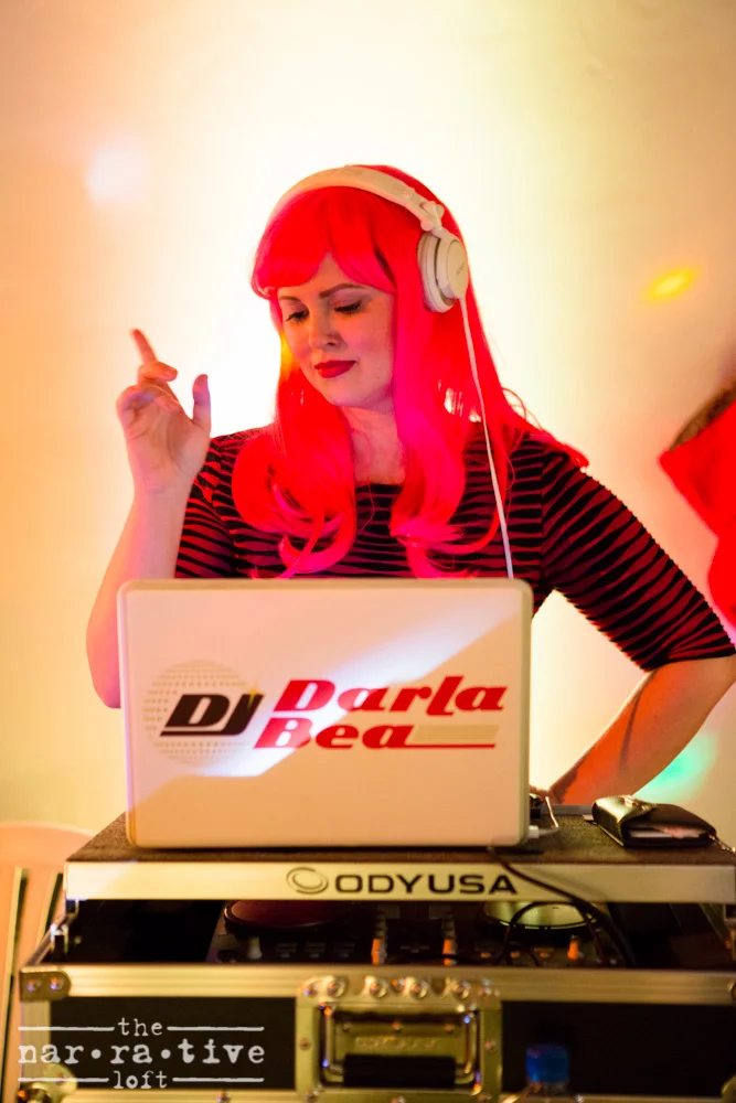 The one and only Darla Bea killing it behind the DJ booth. 