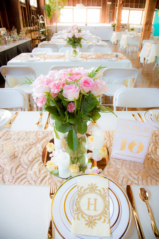 Gorgeous gold accents and perfect pink roses graced the tables.