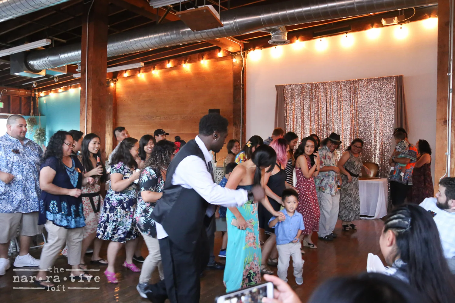 The whole crew dancing along together to the Cupid shuffle.