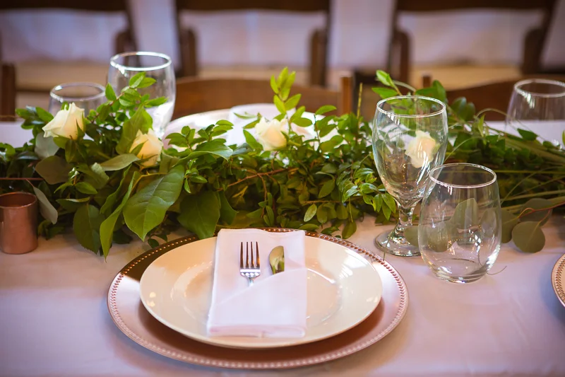 Such a beautiful table arrangement. And don’t you just love those white roses?
