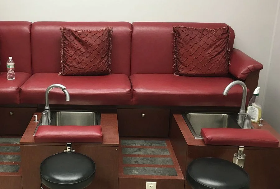 Salon pedicure cushions before re-covering.