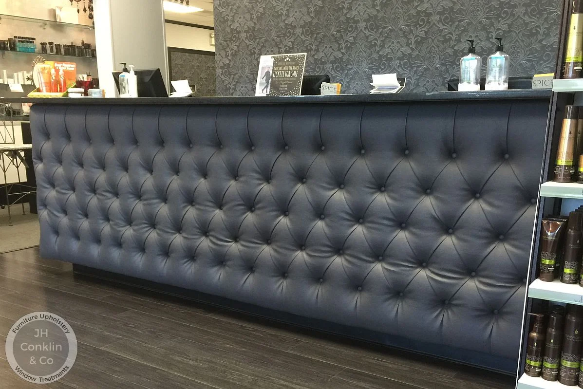 Tufted salon reception desk at Spice Salon in Cherry Hill, NJ