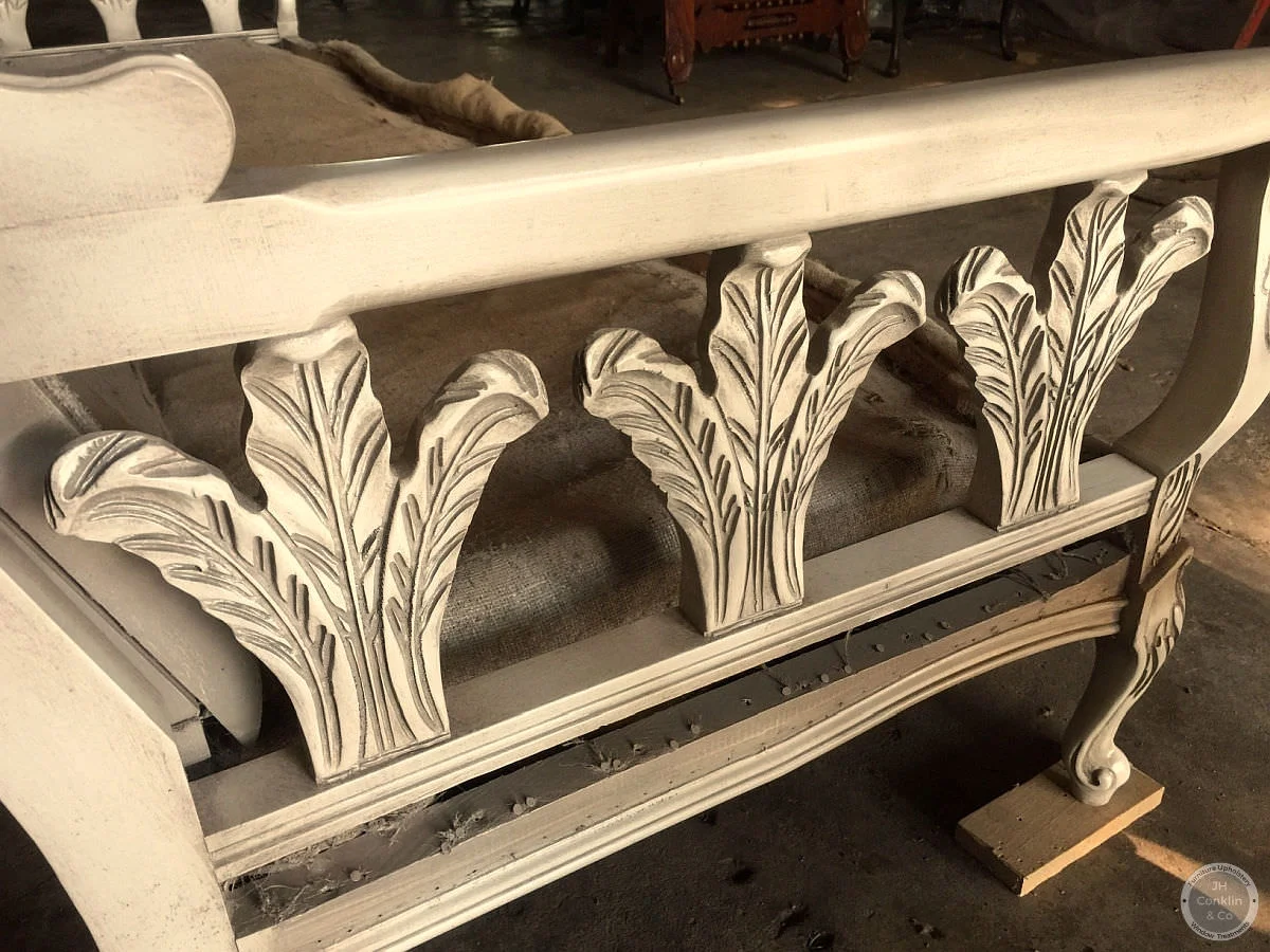 Sofa frame from the 1970's refinished with creamy white lacquer and a grey-brown glaze.