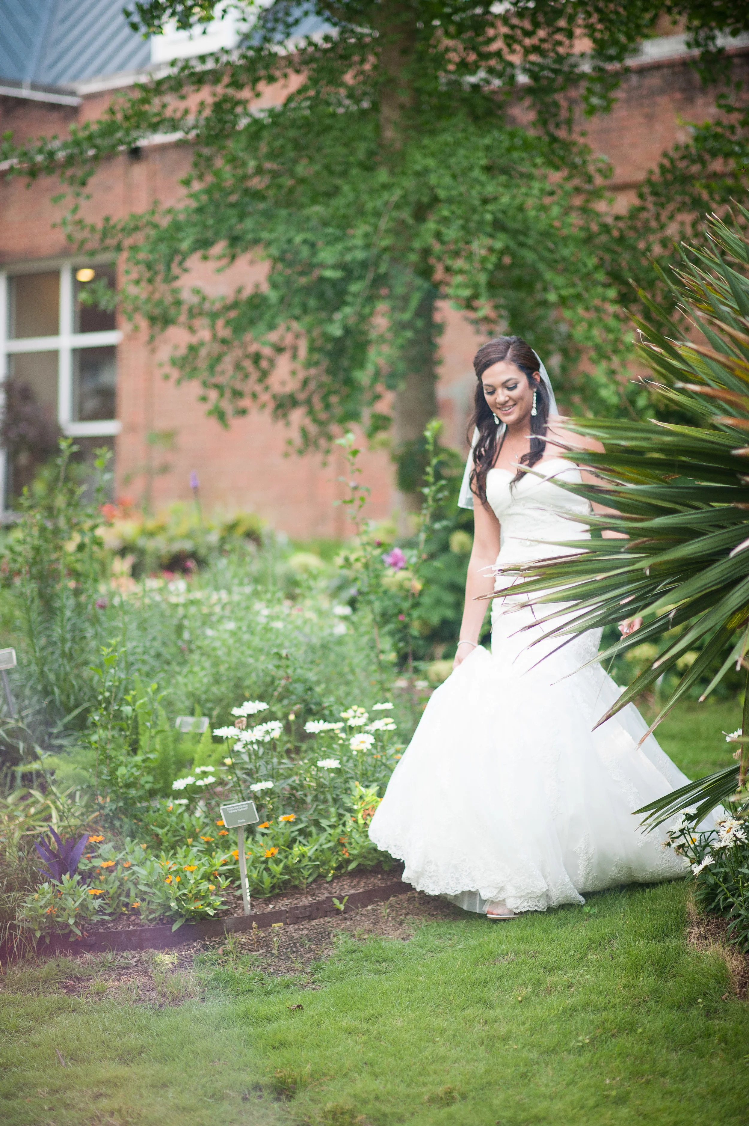 What a beautiful shot of Brooke as she is walking up to her groom, Jonathan, for their first look. Loved this one by Nikki. 