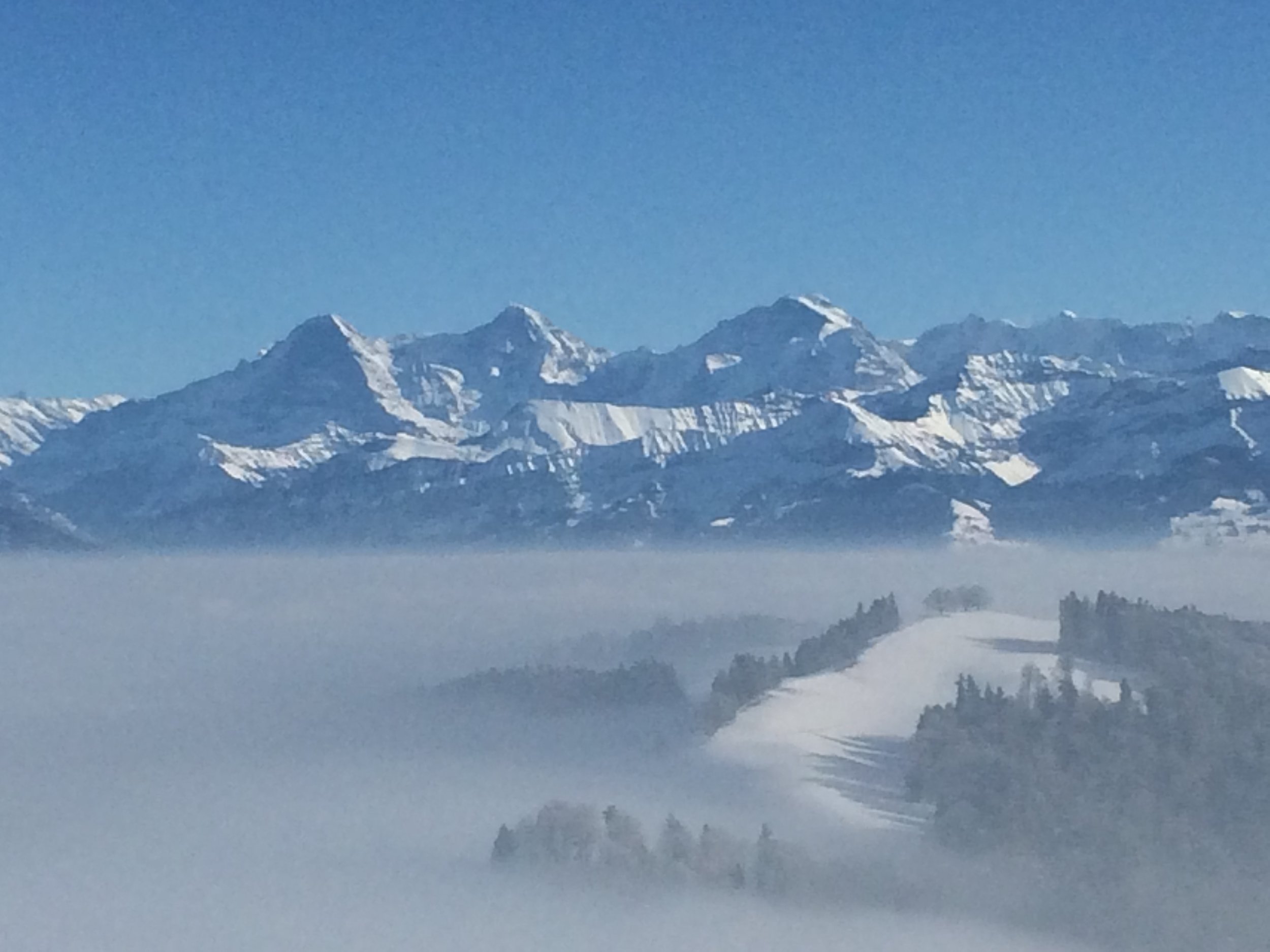 View of the Alps from a hill near where Esther grew up. Rüti bei Riggisberg.