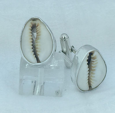 cowrie shell cufflinks by Walter Clymer