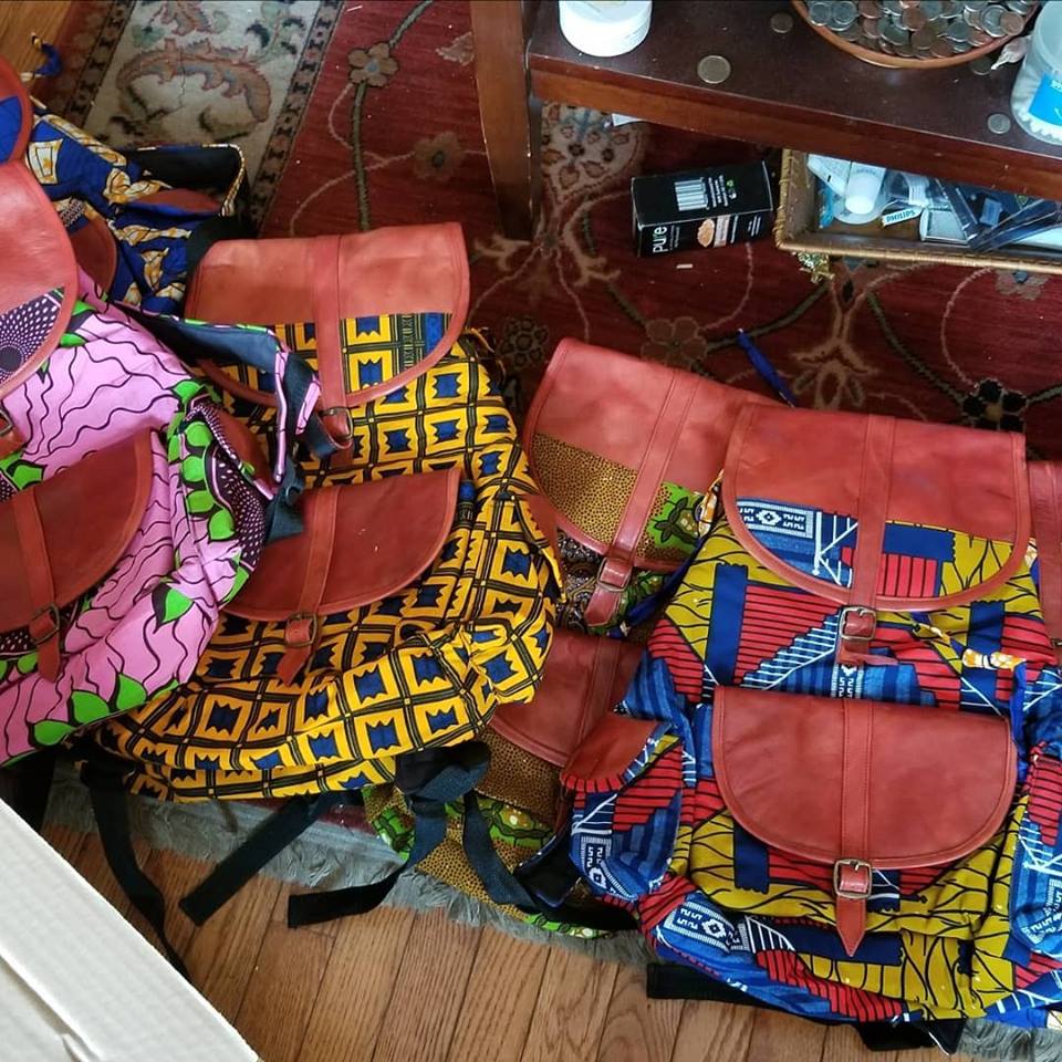 Pile of colorful African wax print purses