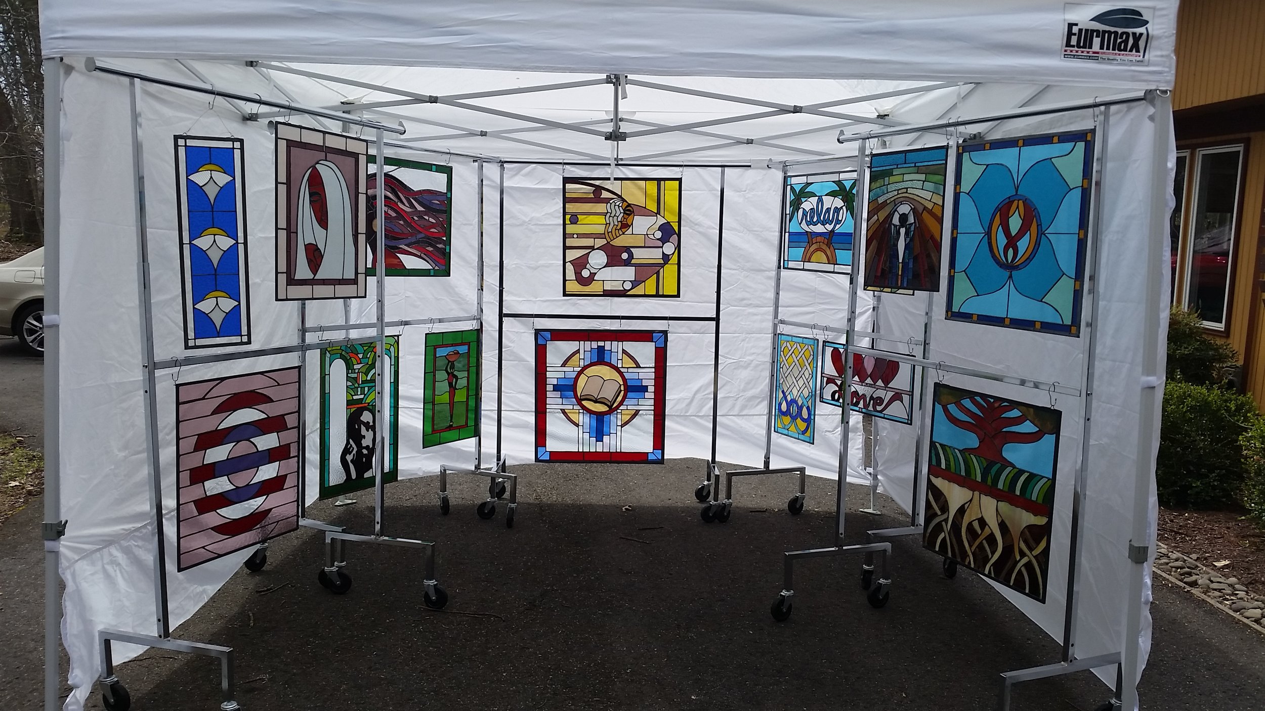 stained glass artist Arvid Lee's booth showing his work