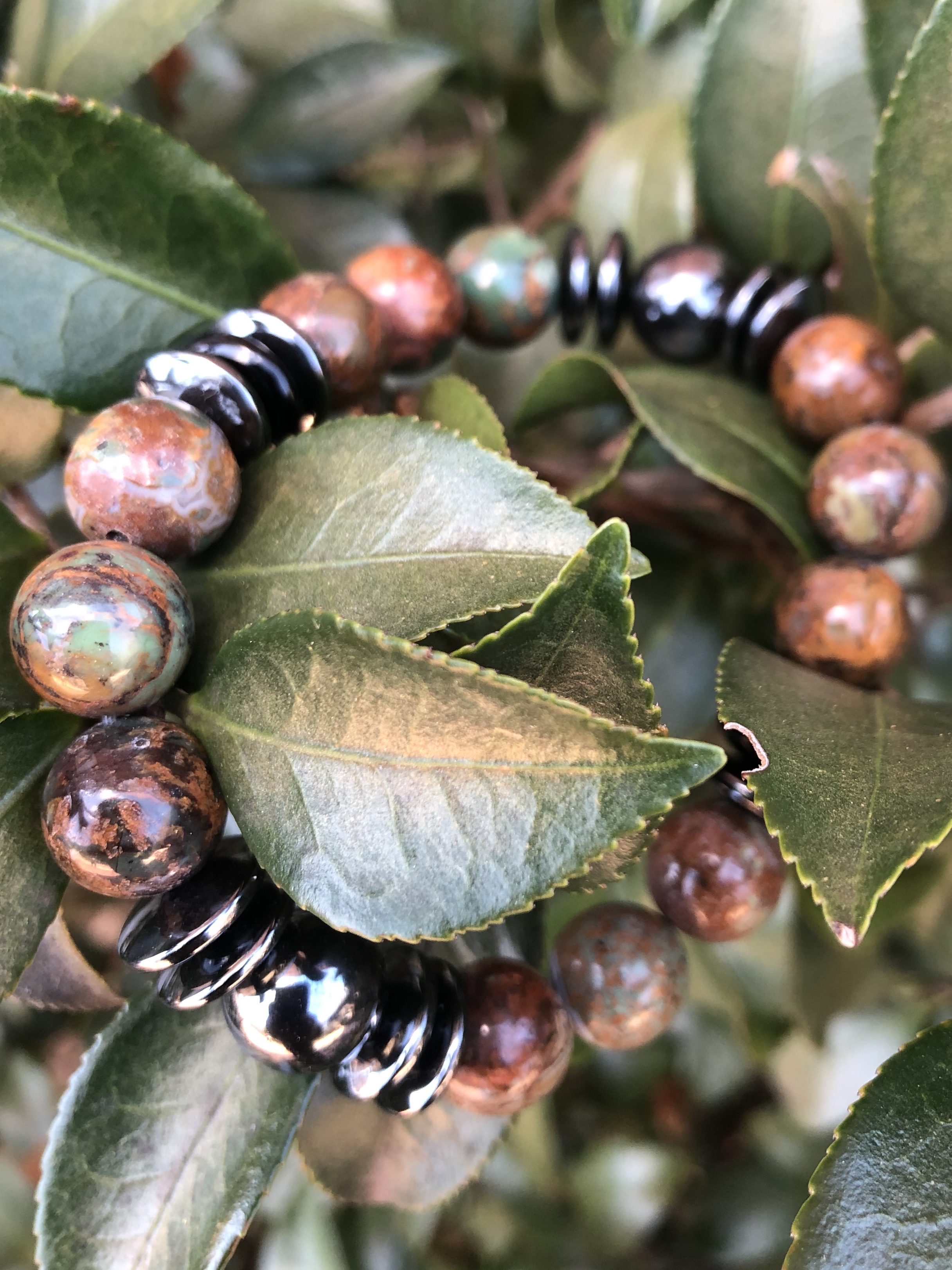 Semi-precious bead bracelet on a bed of leaves