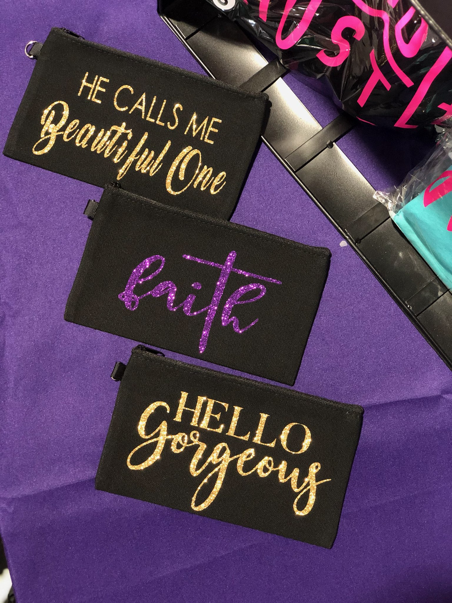 Three small purses:  "Beautiful One", "Faith," and "Hello Gorgeous"