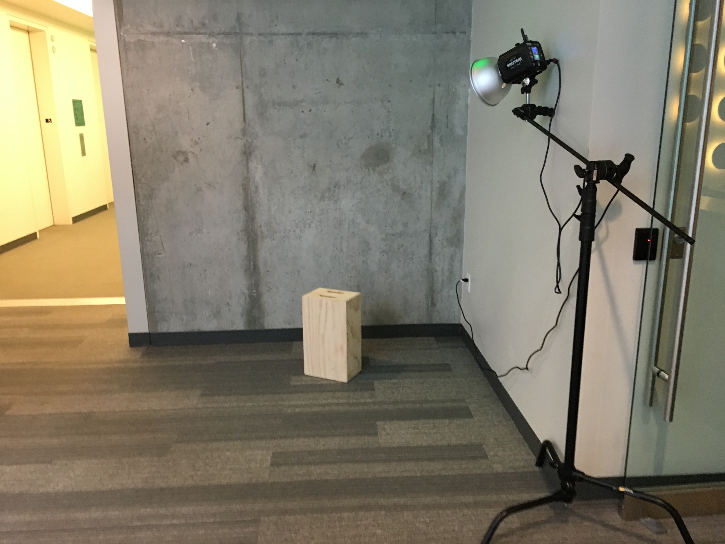 BTS of the hallway by the elevator that we turned into a studio.
