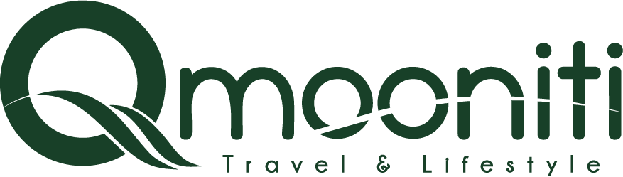 Mooniti Travel & Lifestyle logo featuring a circular leaf motif and modern typography, representing a sustainable travel brand promoting exploration and mindful living.