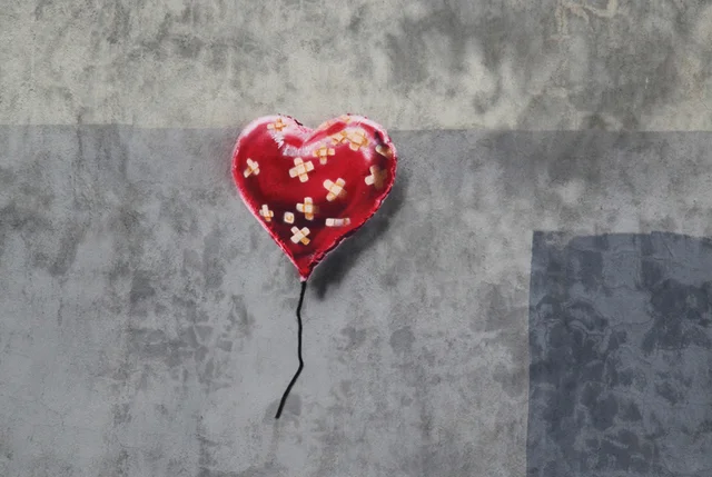 Banksy-NYC-Battle-to-Survive-a-Broken-Heart-in-Brooklyn-2.jpg