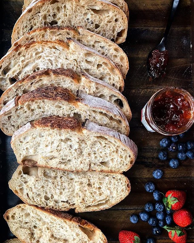 You know what’s super awesome about sourdough besides eating it?
There’s infinite possibilities to get better at it. So I’ve gotten where I wanted to scoring wise, I’ve gotten to 100% hydration, and now I’m working on my crumb- the inside part, making the holes big and open. I’m kind of excited cuz I’m further than I’ve ever been before.
Note to self tho: don’t melt cheese on giant open crumbs unless you like to be cleaning the bottom of your oven. No judgement Marie Kondo.... #bread #crumb #sourdough #sourdoughbread #spread #breakfast #yum #opencrumb #food #f52grams