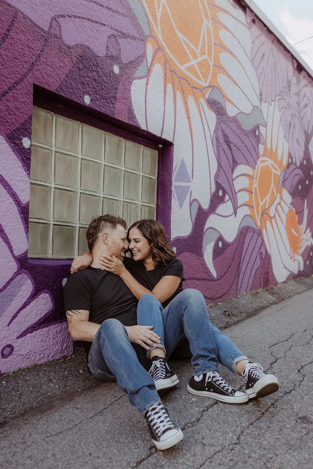 kicking it with the murals of Nelson BC with this couples session