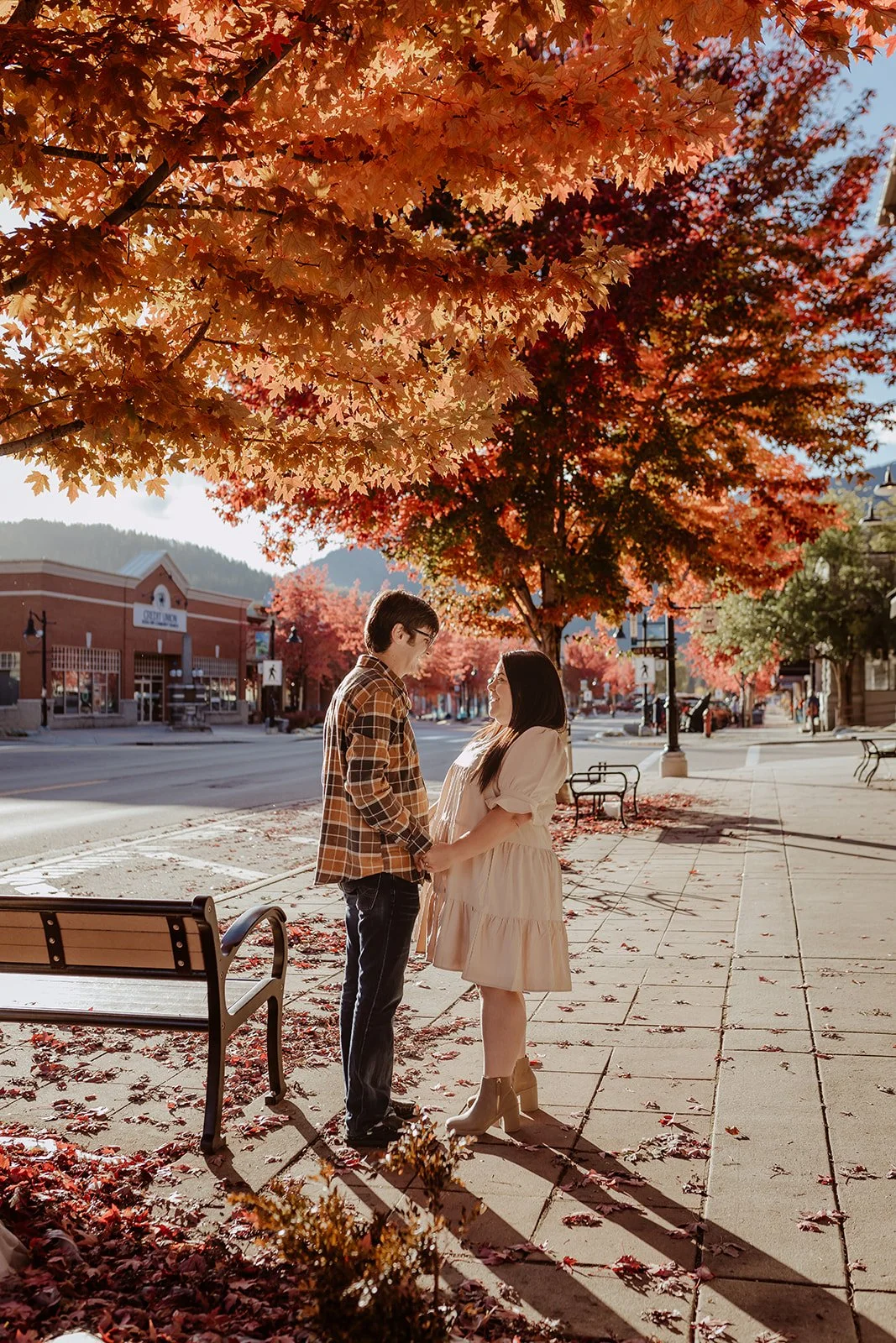 the sweetest fall engagement session, embracing beautiful downtown Rossland BC