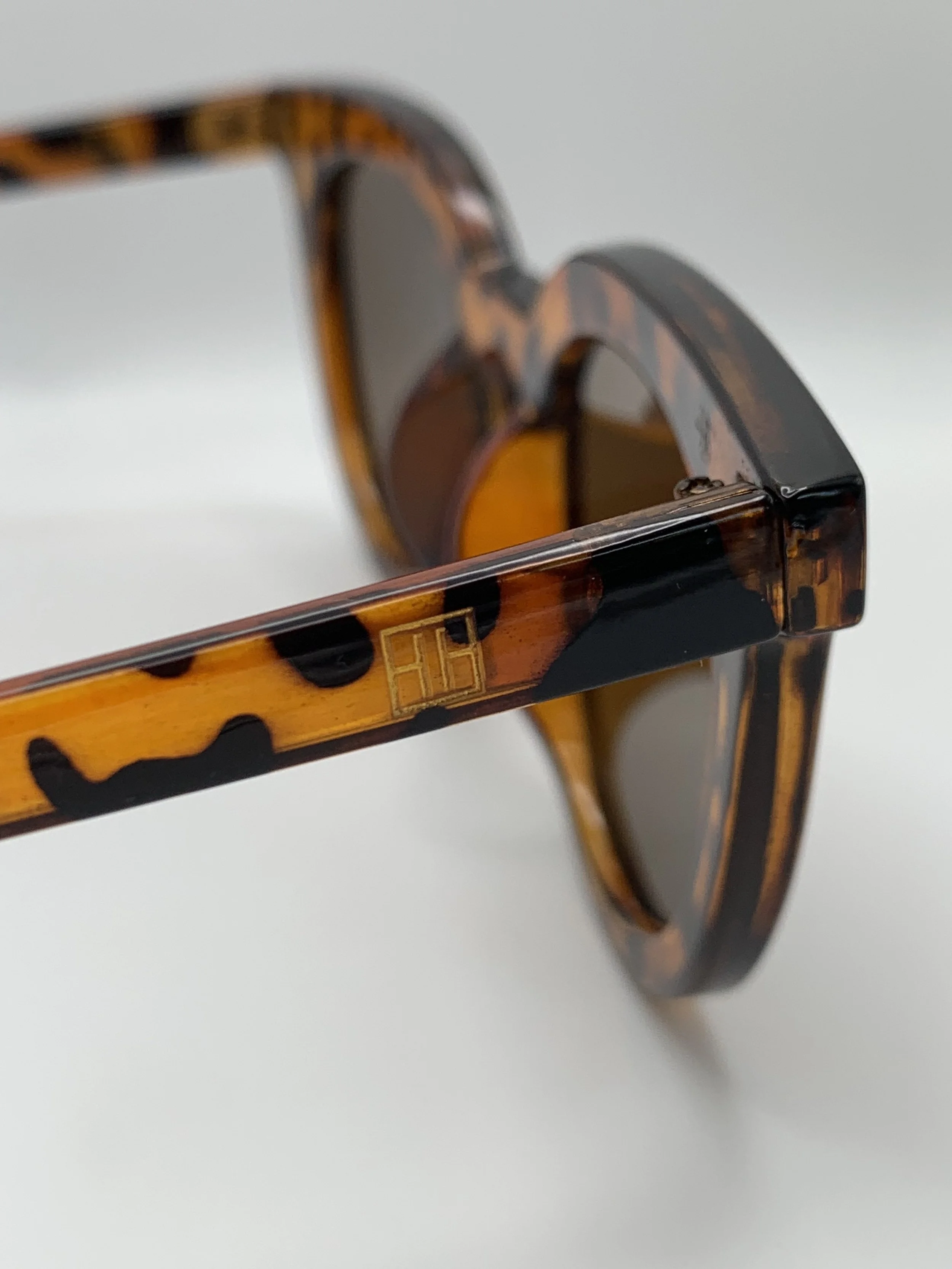 Louise in Tortoise Logo Detail.JPG