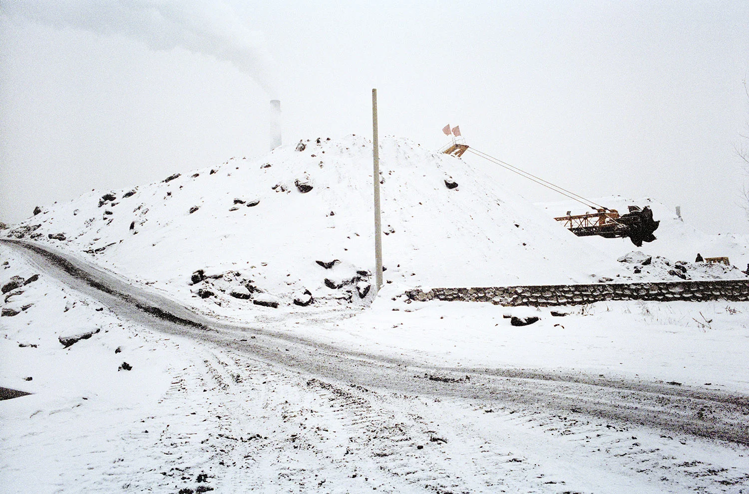   Coal stock pile. Tonghua, Jilin, China.  