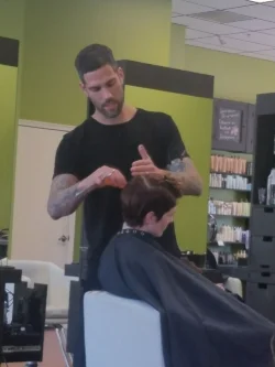 Josh give our stylist Darlene a new cut. 