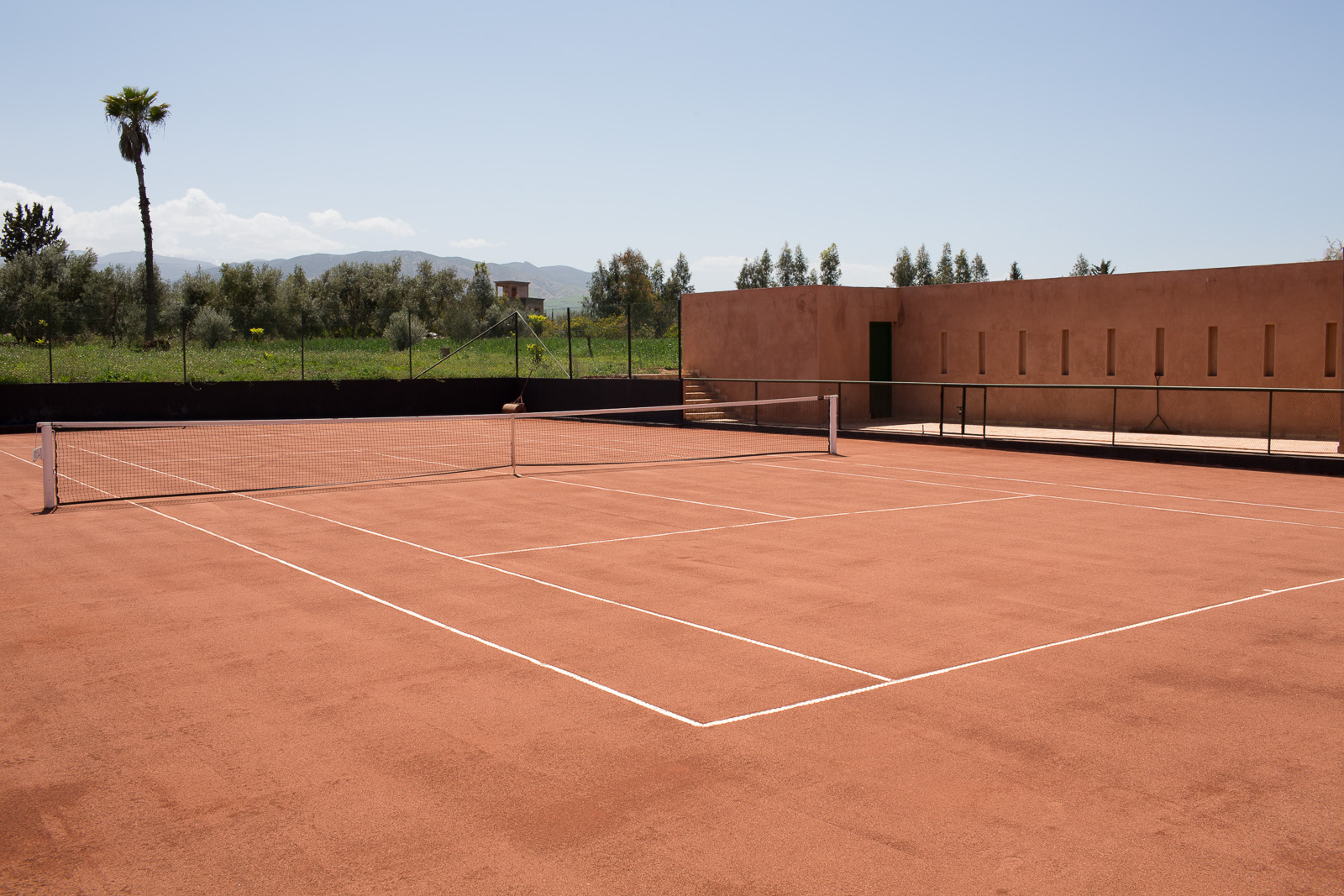 Tennis court - clay court with club house and shower
