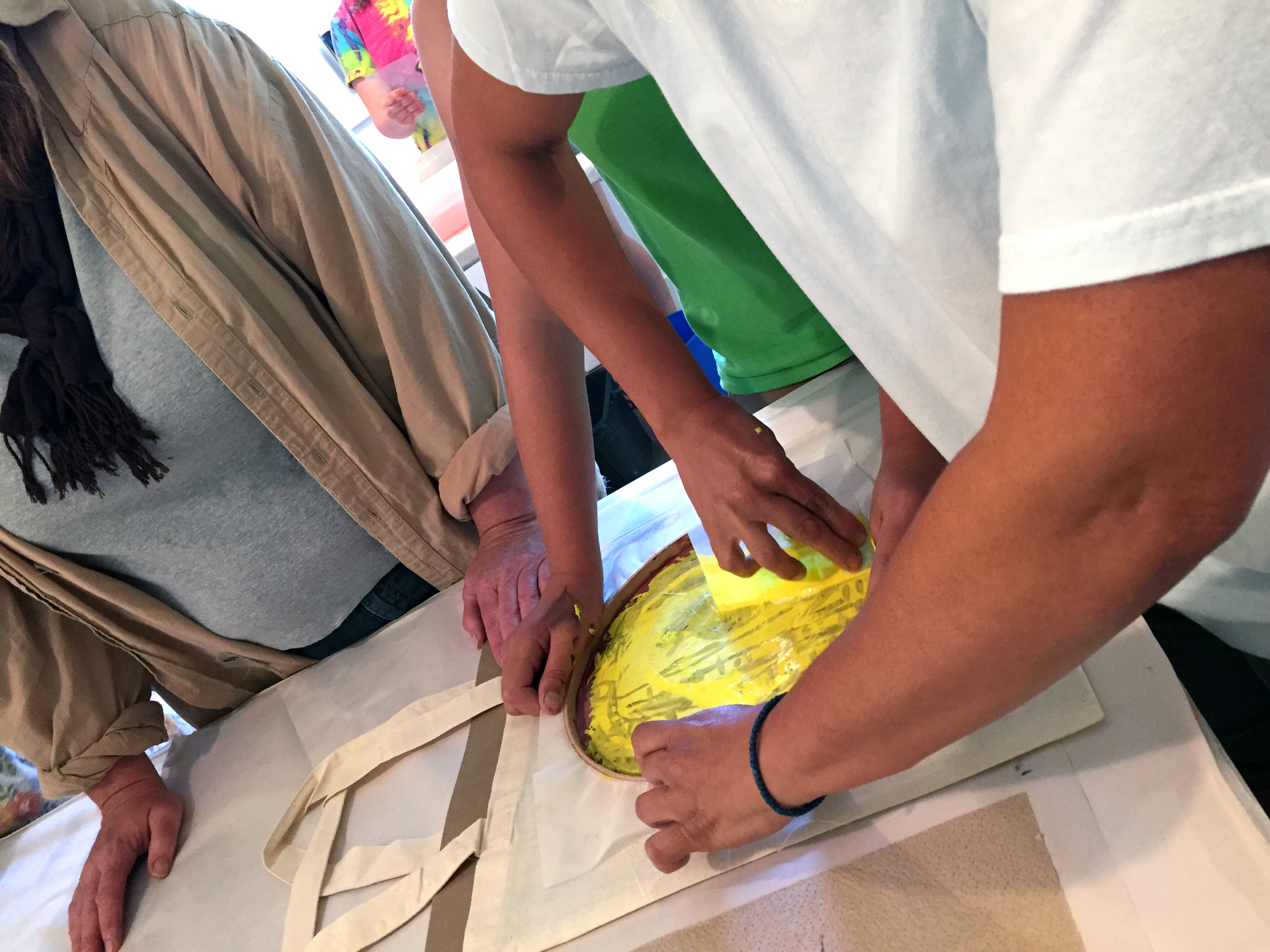 Some great teamwork taking place with Arista's DIY silkscreening