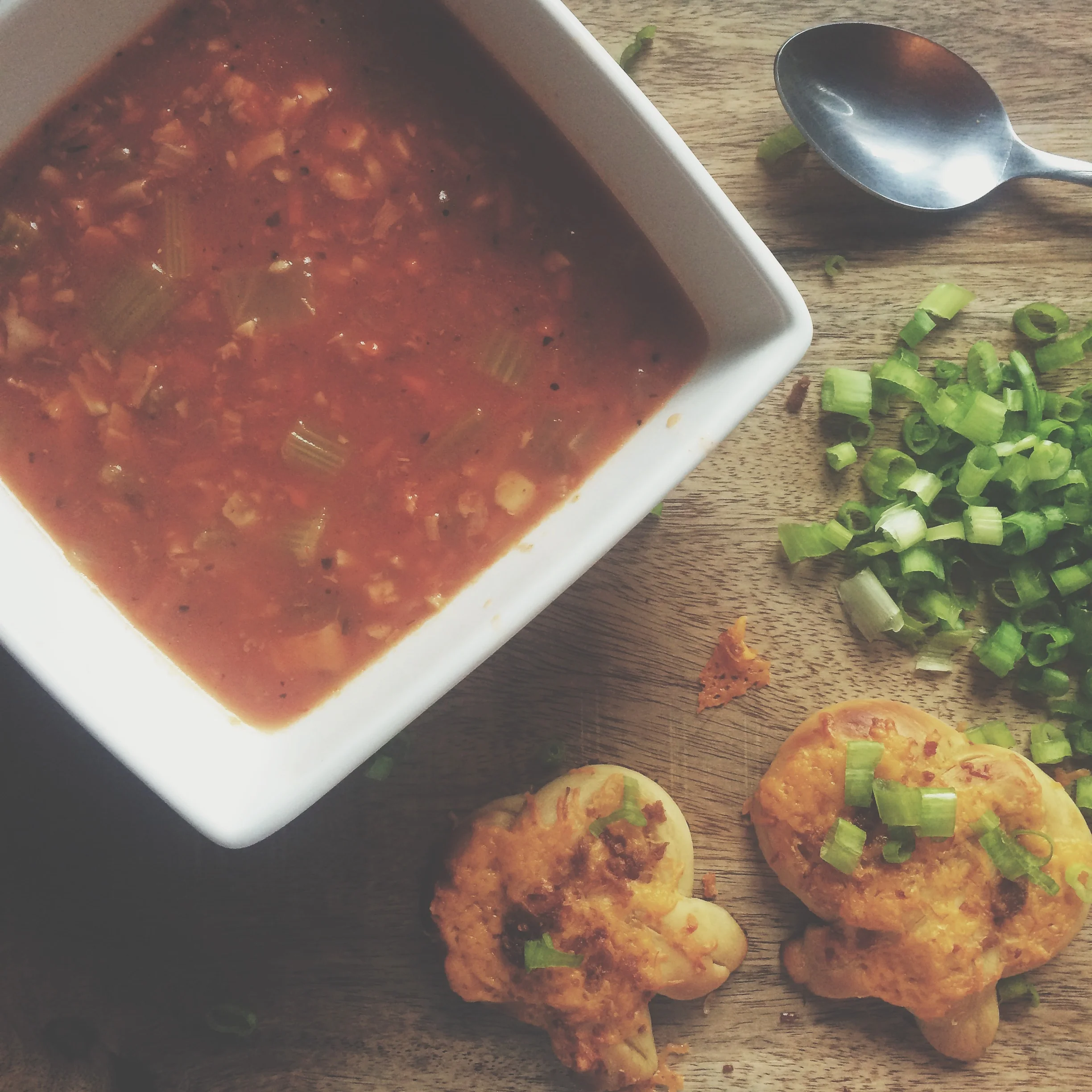 The warm pretzels were topped with chopped scallions and served with a spicy clam chowder that James had whipped up. 