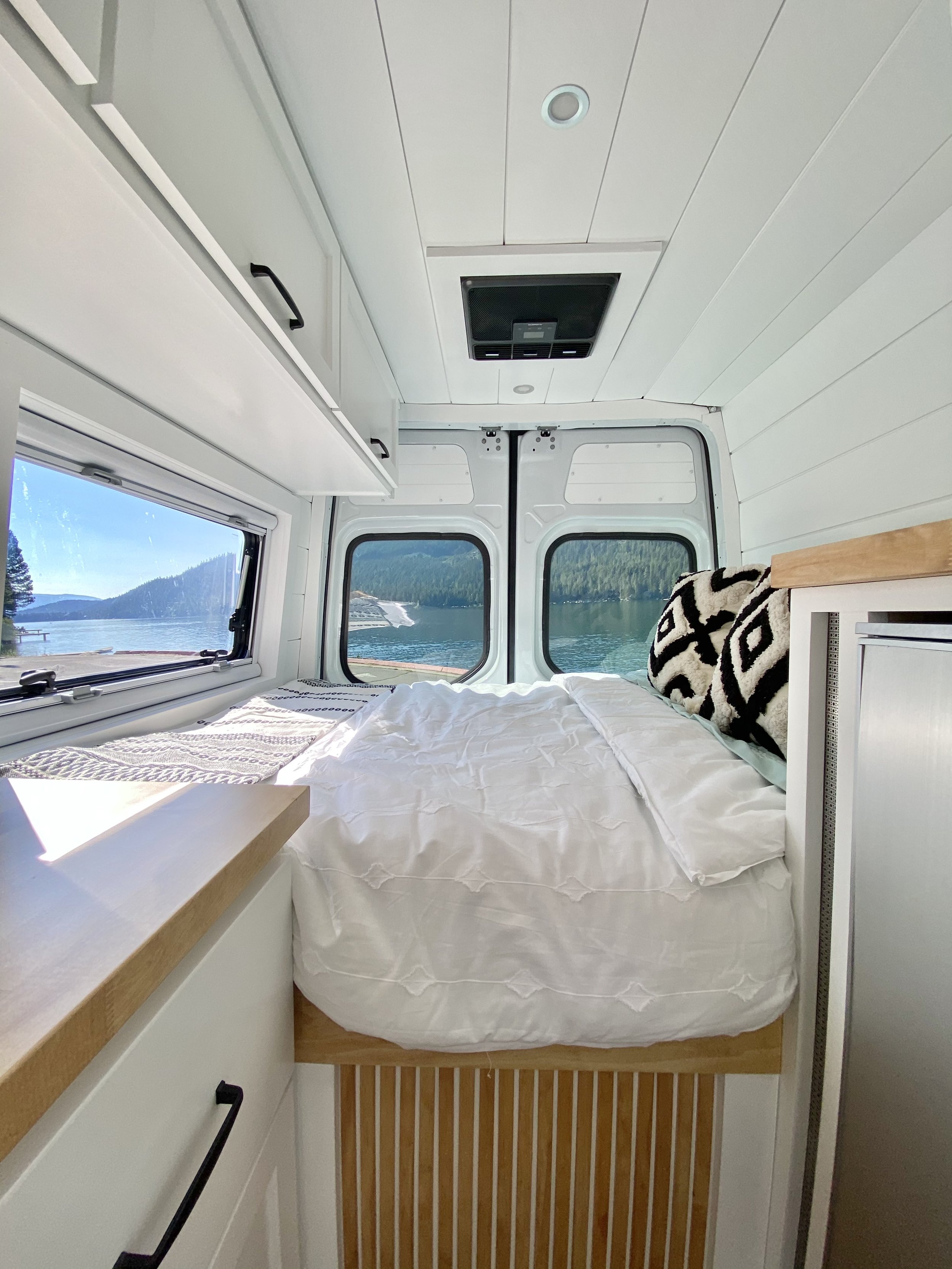 Custom Crafted Luxury Van Conversion for Family of 3 main bed 2.jpg