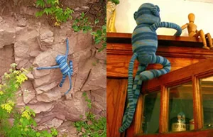He climbs everything--walls, doors, the chimney at the cabin, and rock walls at the big lake.