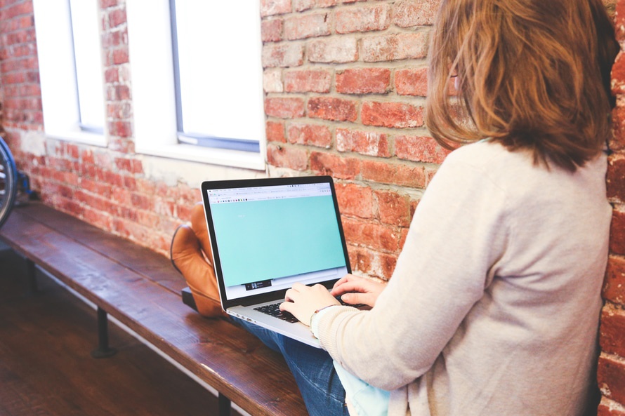 Working on a laptop | Digital Insight Labs