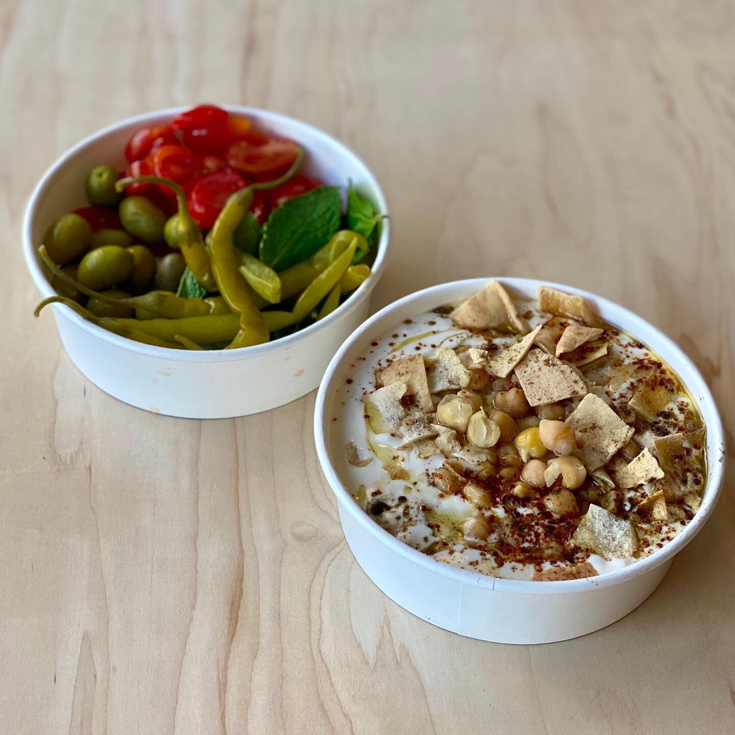 Do you know what you're having for lunch today? Wait, let us answer that for you, Hummus Fatteh.⁠⁠
⁠⁠
A mix of chickpeas, garlic, lemon juice, cumin, toasted bread served in yogurt tahini and olive oil. Be careful, you're already starting to drool! O
