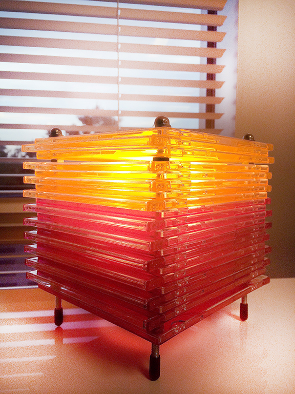   Custom LED desk lamps—made with colorful CD jewel cases.  