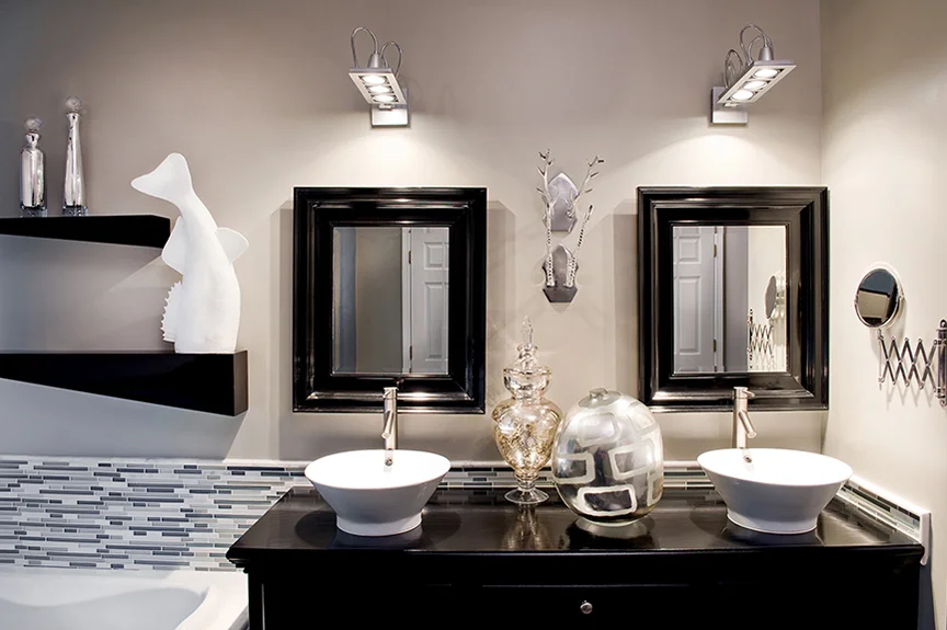   Master Bath—industrial lighting with a collection of mercury glass.  