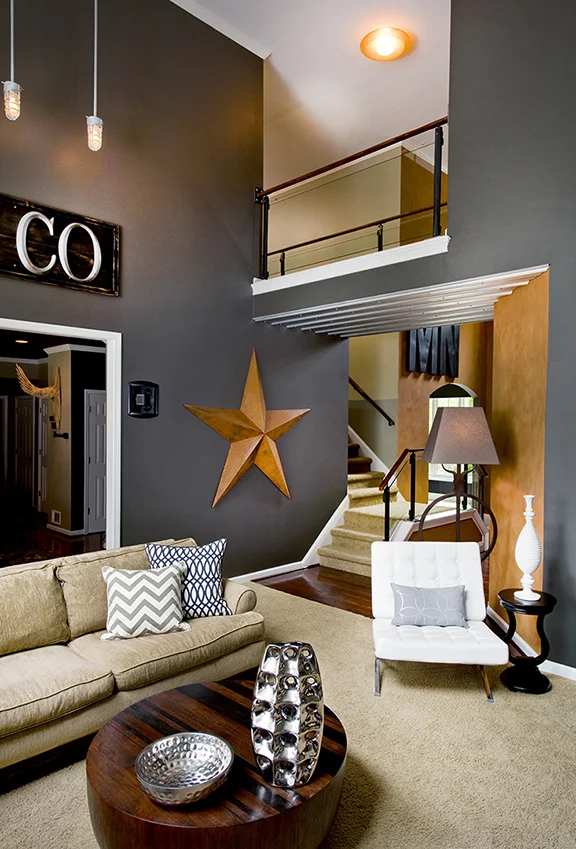   Great Room—steel&nbsp;&amp; glass stair rails, corrugated metal &amp; a rusty Amish Star.  