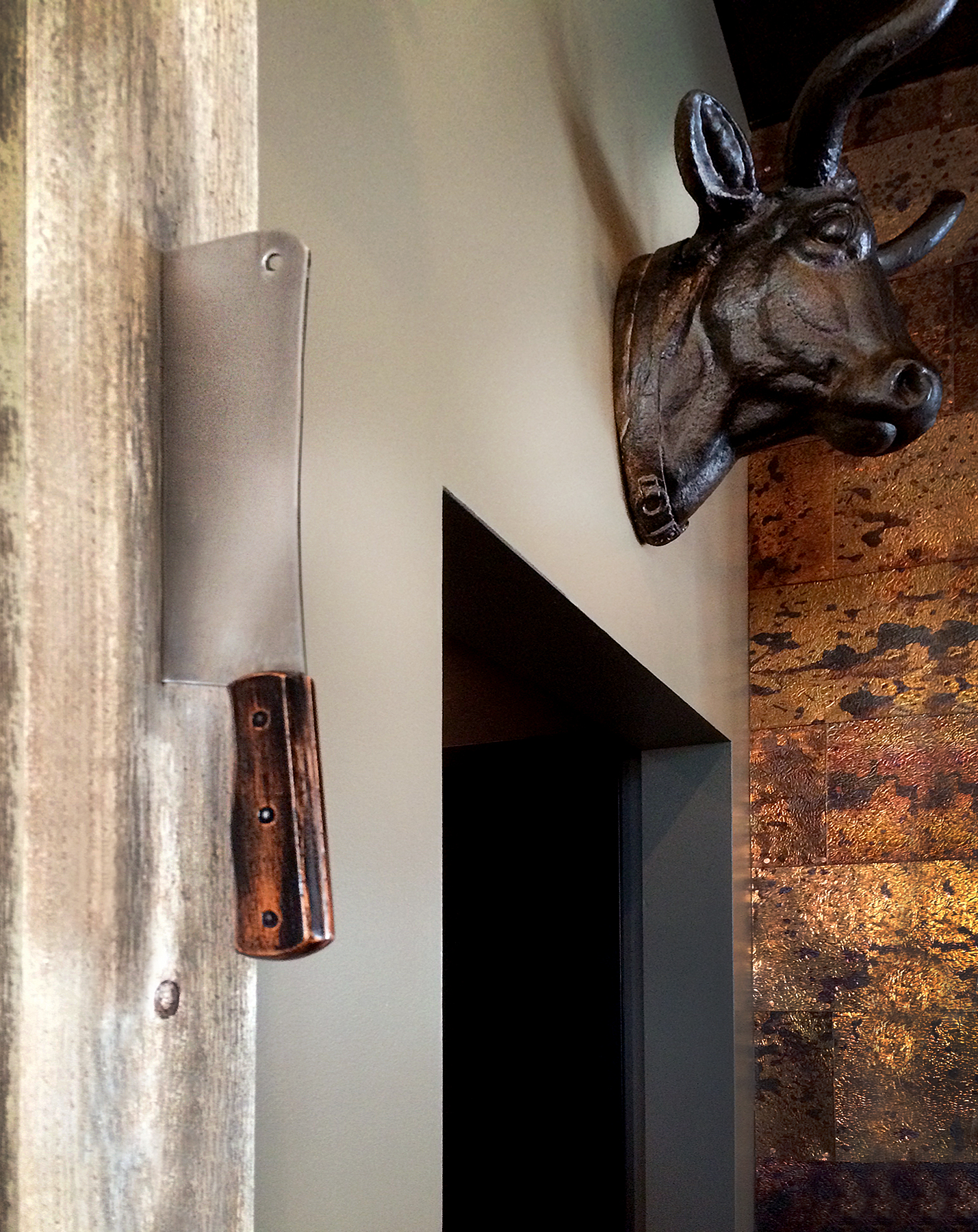  Embedded meat cleaver into daily specials display. 