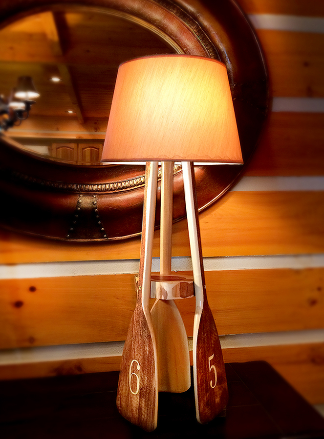  Hand-made paddle lamp with carved numbers. 