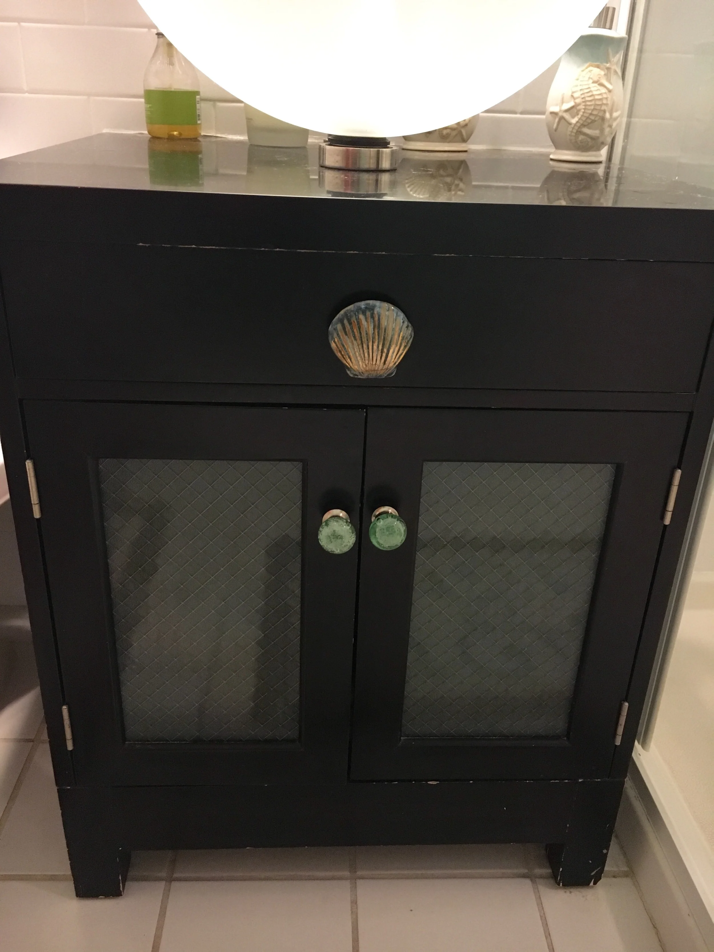 These drawer and cabinet knobs were recent Anthropologie purchases, and the shell was even on sale!